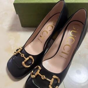 Gucci Black Pumps with Gold Accents